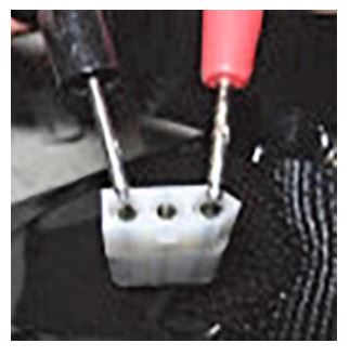 TSI 854036 Environmental DustTrak Rechargeable Battery System - Using a DC Volt Meter, connect the “red” (positive) test lead of the meter to the battery pack
